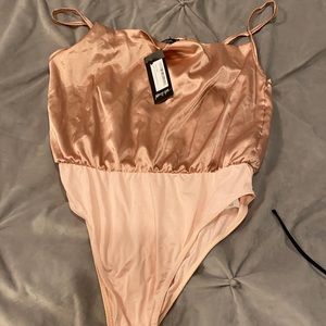 Pink satin body suit